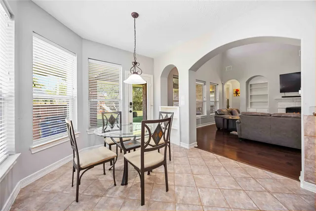 a view of a livingroom with furniture and windows