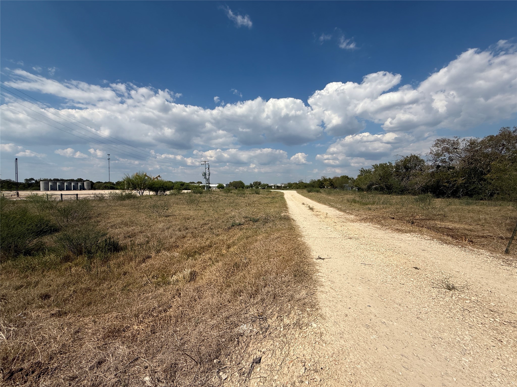 506 South Colorado Street Flatonia, TX 78941 - Photo 12 of 21 a view of a lake with beach in back