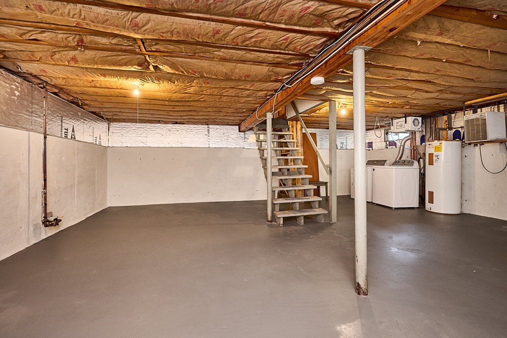 134 Tracy Circle Amherst, MA 01002 - Photo 18 of 37 a view of empty room with wooden ceiling