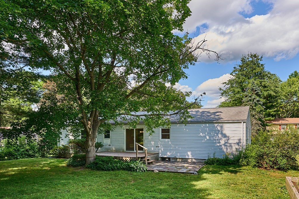 134 Tracy Circle Amherst, MA 01002 - Photo 22 of 37 a view of a house with a yard balcony and sitting area