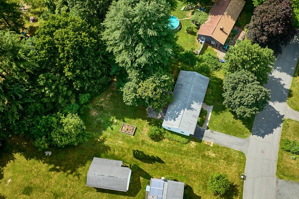 134 Tracy Circle Amherst, MA 01002 - Photo 28 of 37 an aerial view of a house with a yard and lake view
