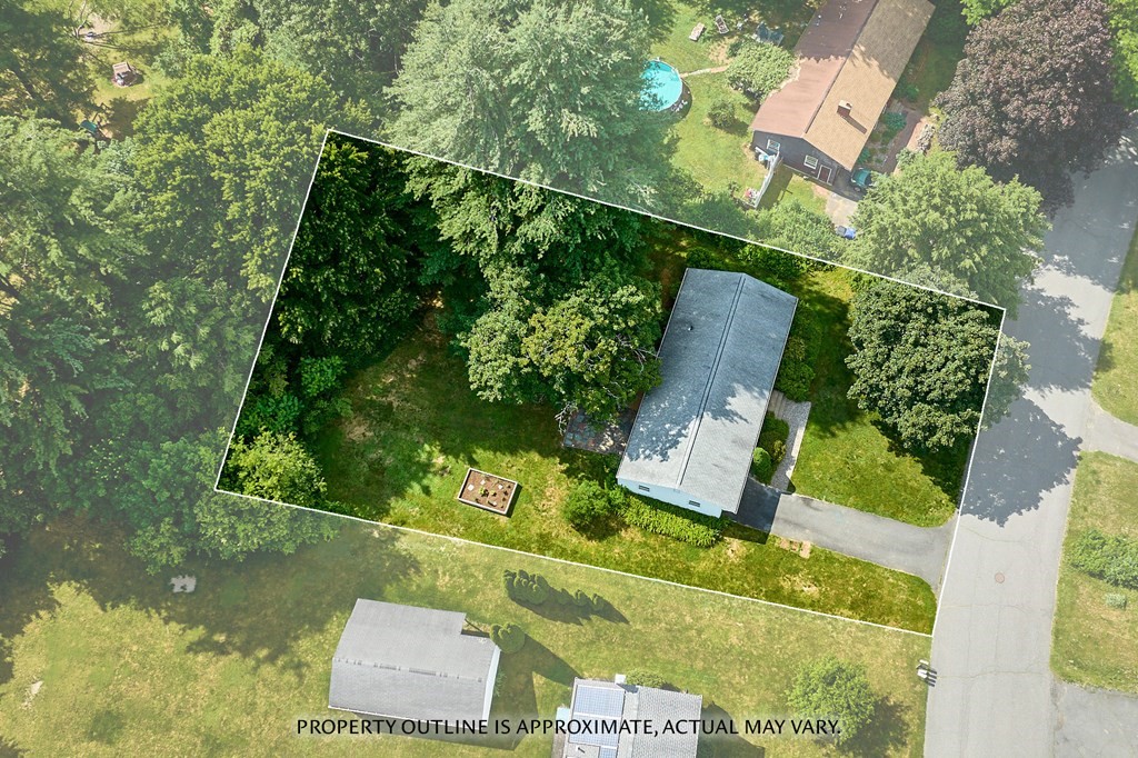 134 Tracy Circle Amherst, MA 01002 - Photo 29 of 37 an aerial view of a house with a yard basket ball court and outdoor seating