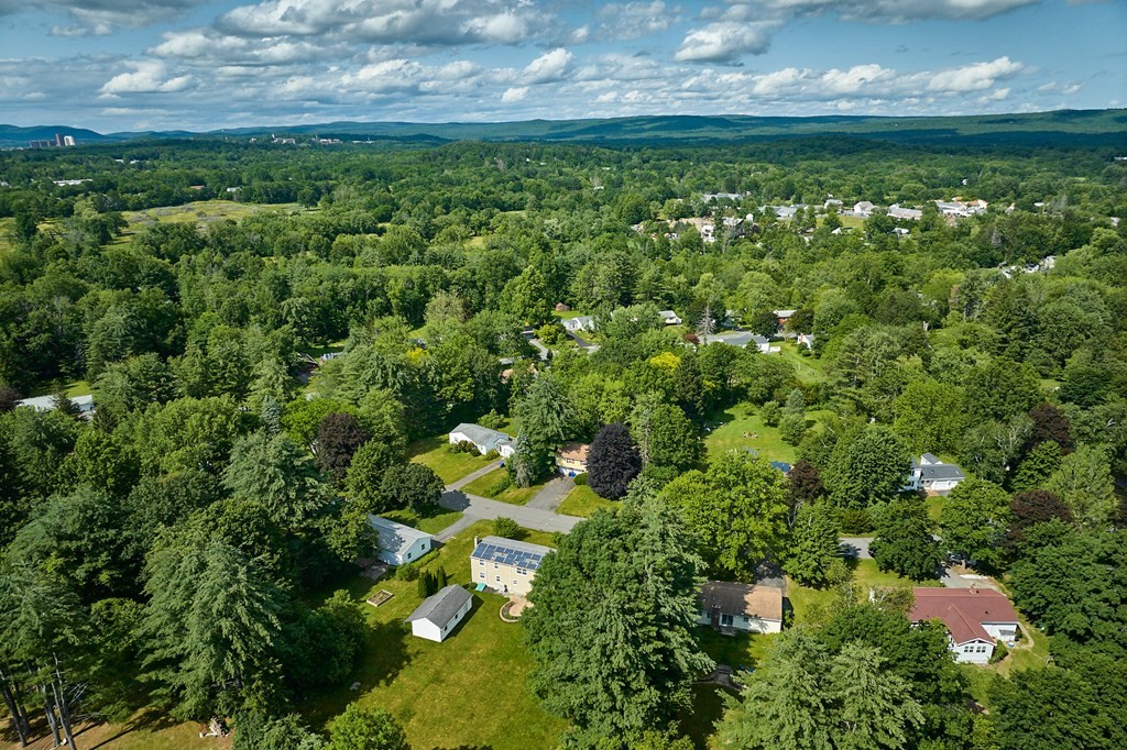 134 Tracy Circle Amherst, MA 01002 - Photo 32 of 37 a view of a yard with a house