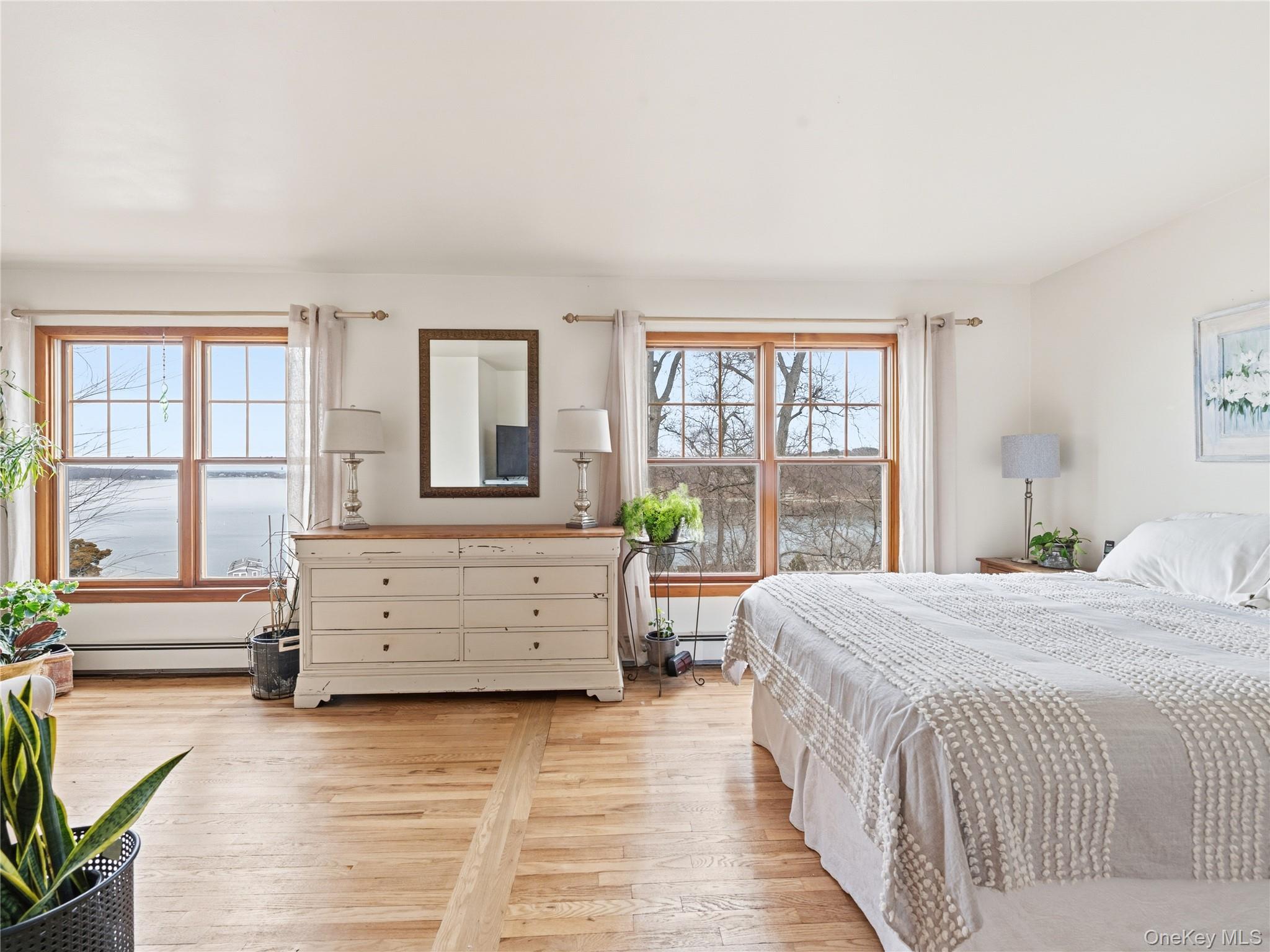 175 Taft Crescent Centerport, NY 11721 - Photo 13 of 37 Primary bedroom on 1st floor with glorious waterview