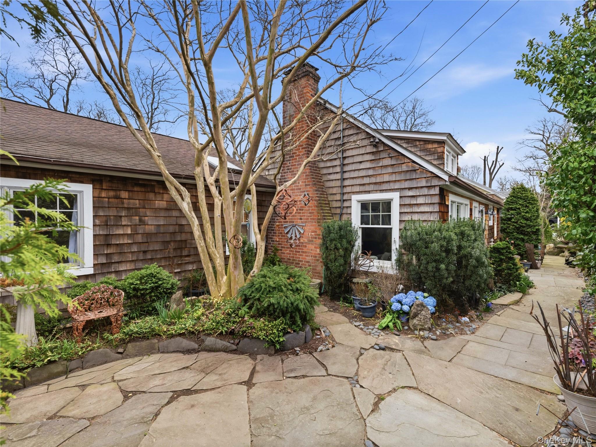 175 Taft Crescent Centerport, NY 11721 - Photo 35 of 37 Stone patio in front of house