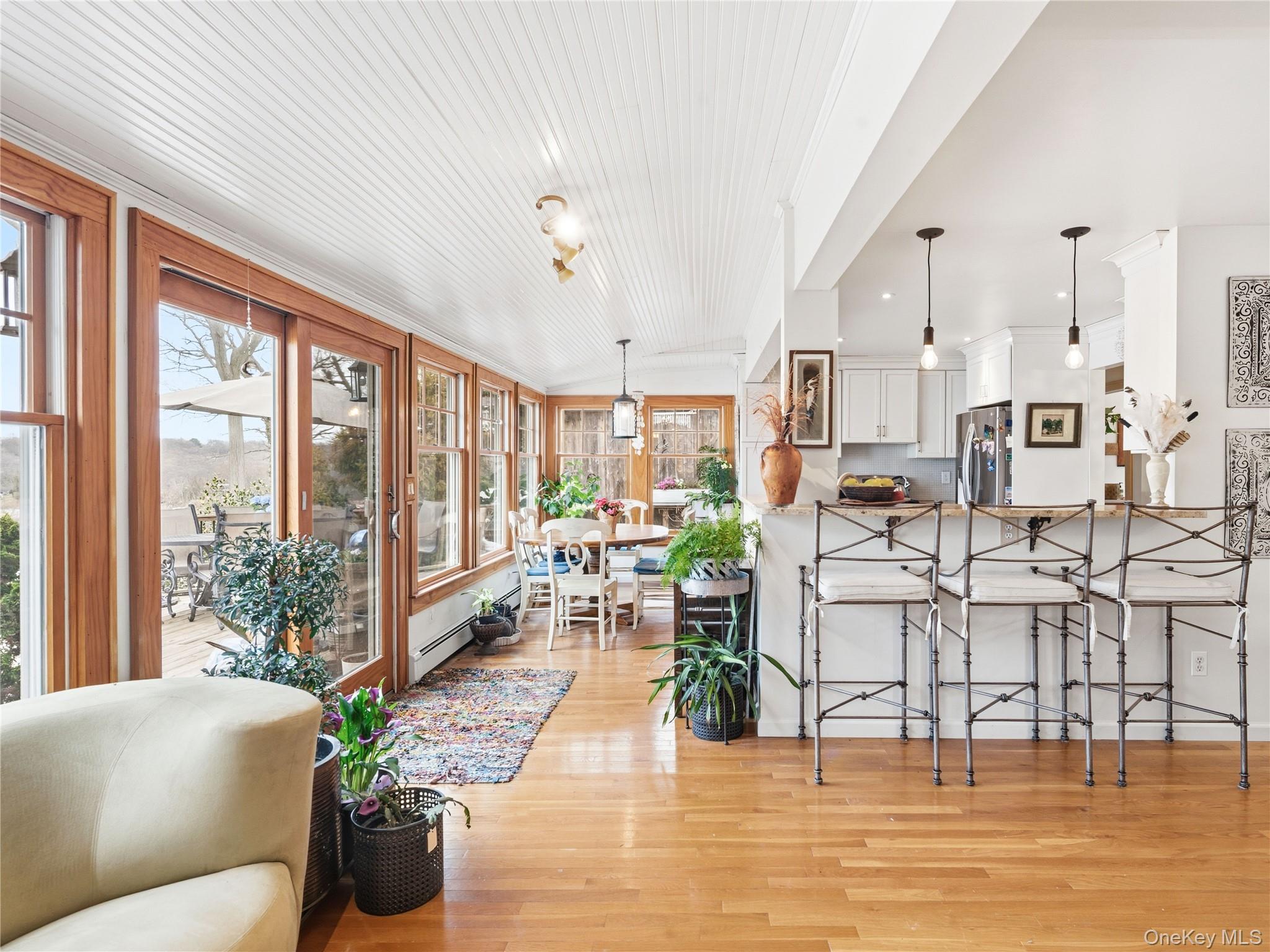 175 Taft Crescent Centerport, NY 11721 - Photo 8 of 37 Breakfast bar and Eat-in-Kitchen