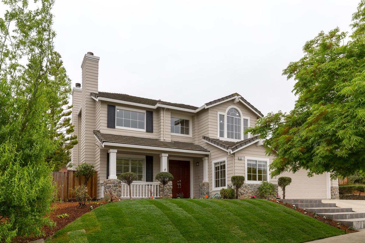4597 Pacific Rim Way San Jose, CA 95121 - Photo 1 of 10 a front view of a house with garden