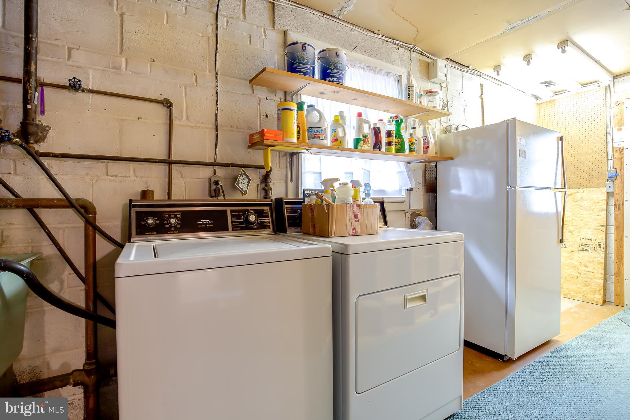 3143 Flintlock Road Fairfax, VA 22030 - Photo 27 of 48 Laundry area, extra fridge, crawl space