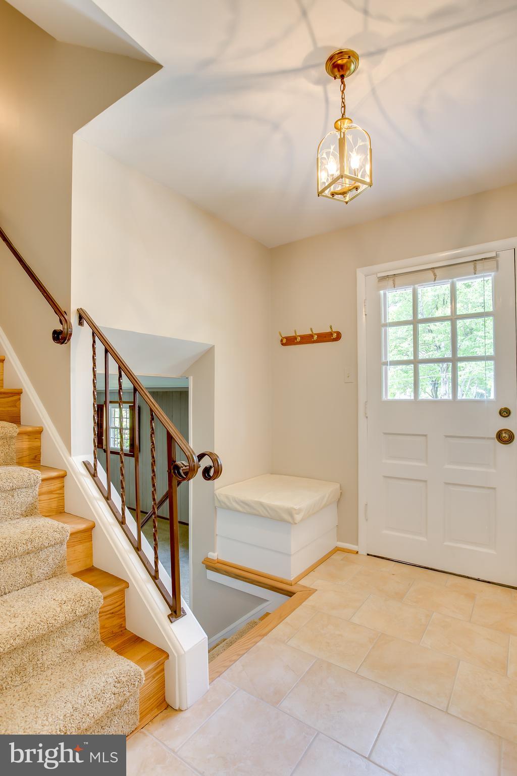 3143 Flintlock Road Fairfax, VA 22030 - Photo 28 of 48 Ceramic tile entry with sitting storage nook