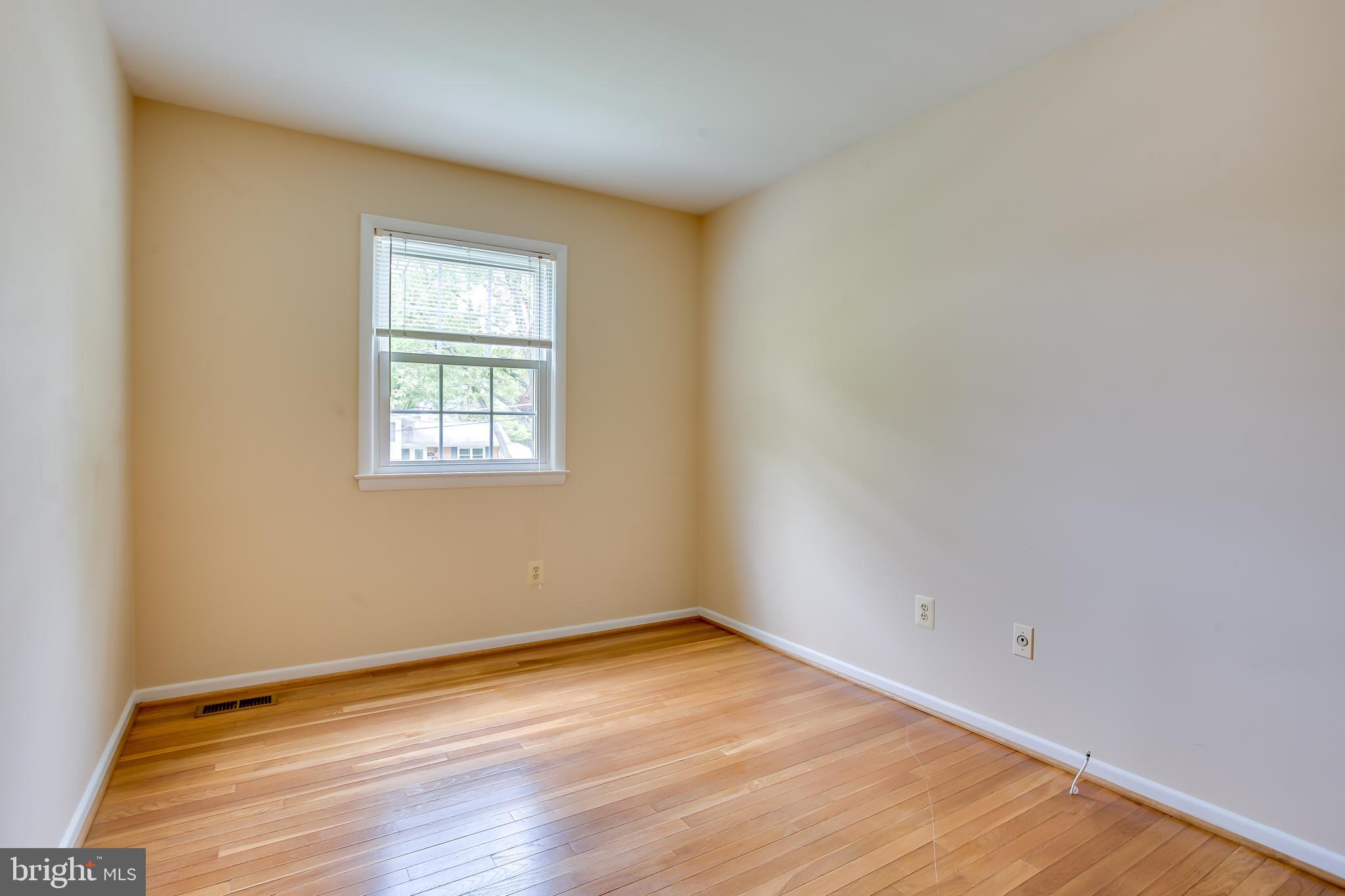 3143 Flintlock Road Fairfax, VA 22030 - Photo 29 of 48 Bedroom with hardwood floors