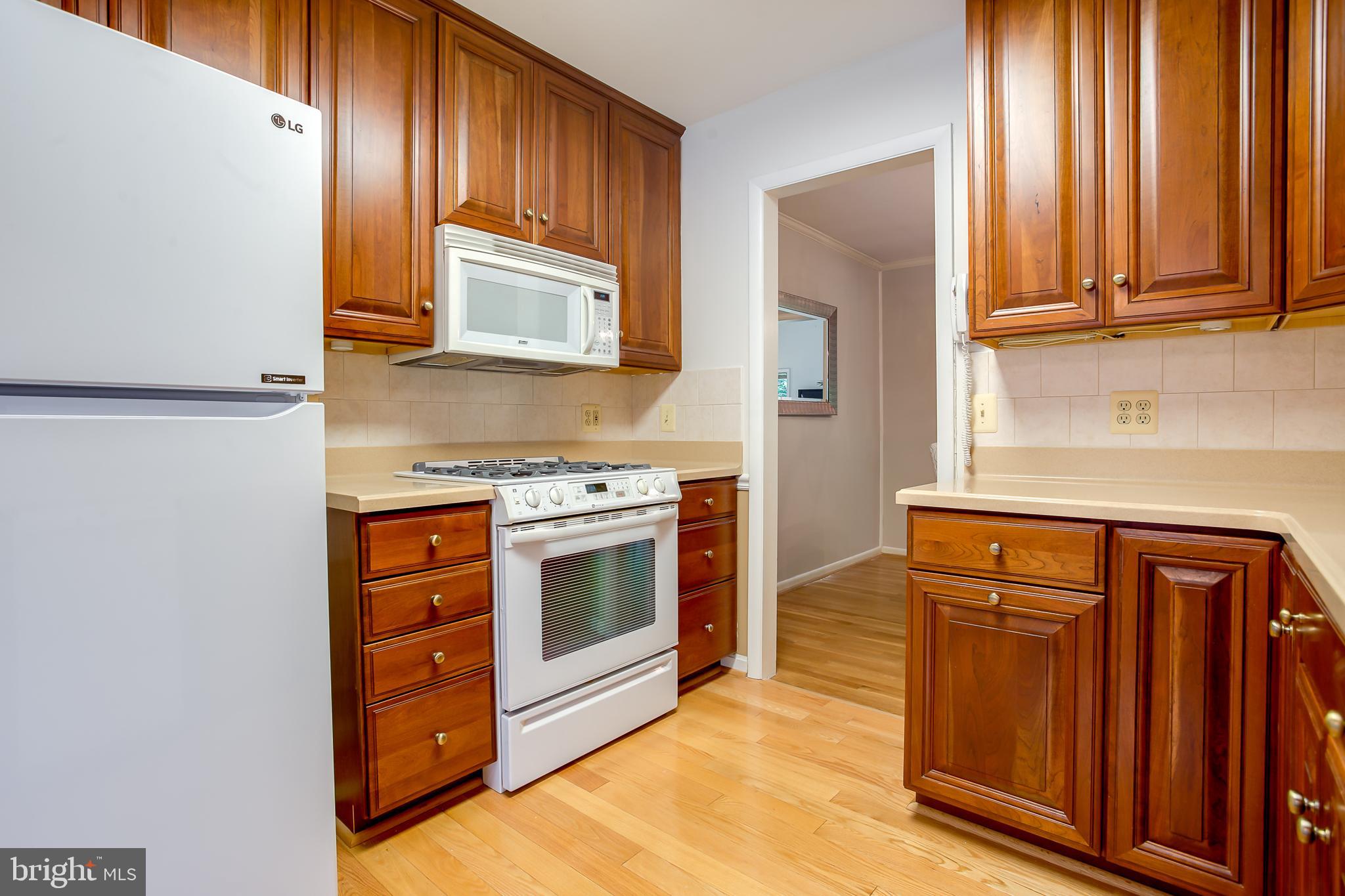 3143 Flintlock Road Fairfax, VA 22030 - Photo 9 of 48 Upgraded cabinetry, lazy susan, pull out trash