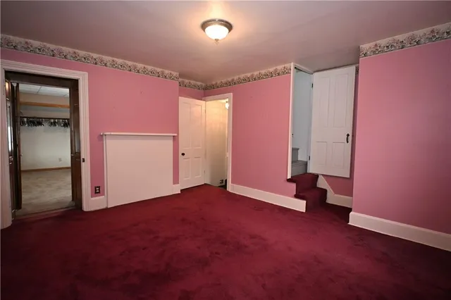 an empty room with closet