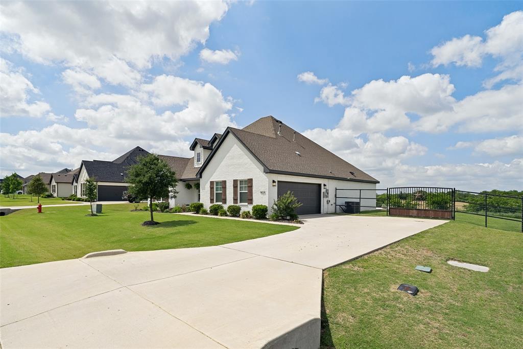 9424 Wildcat Ridge Godley, TX 76044 - Photo 2 of 25 a view of big yard in front of house with a yard