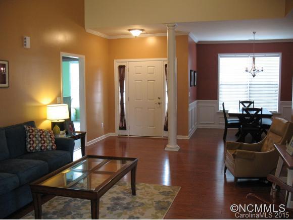 156 Pamlico Road Fletcher, NC 28732 - Photo 4 of 22 a living room with furniture and a potted plant