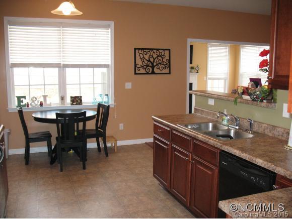 156 Pamlico Road Fletcher, NC 28732 - Photo 8 of 22 a view of a dining room with furniture