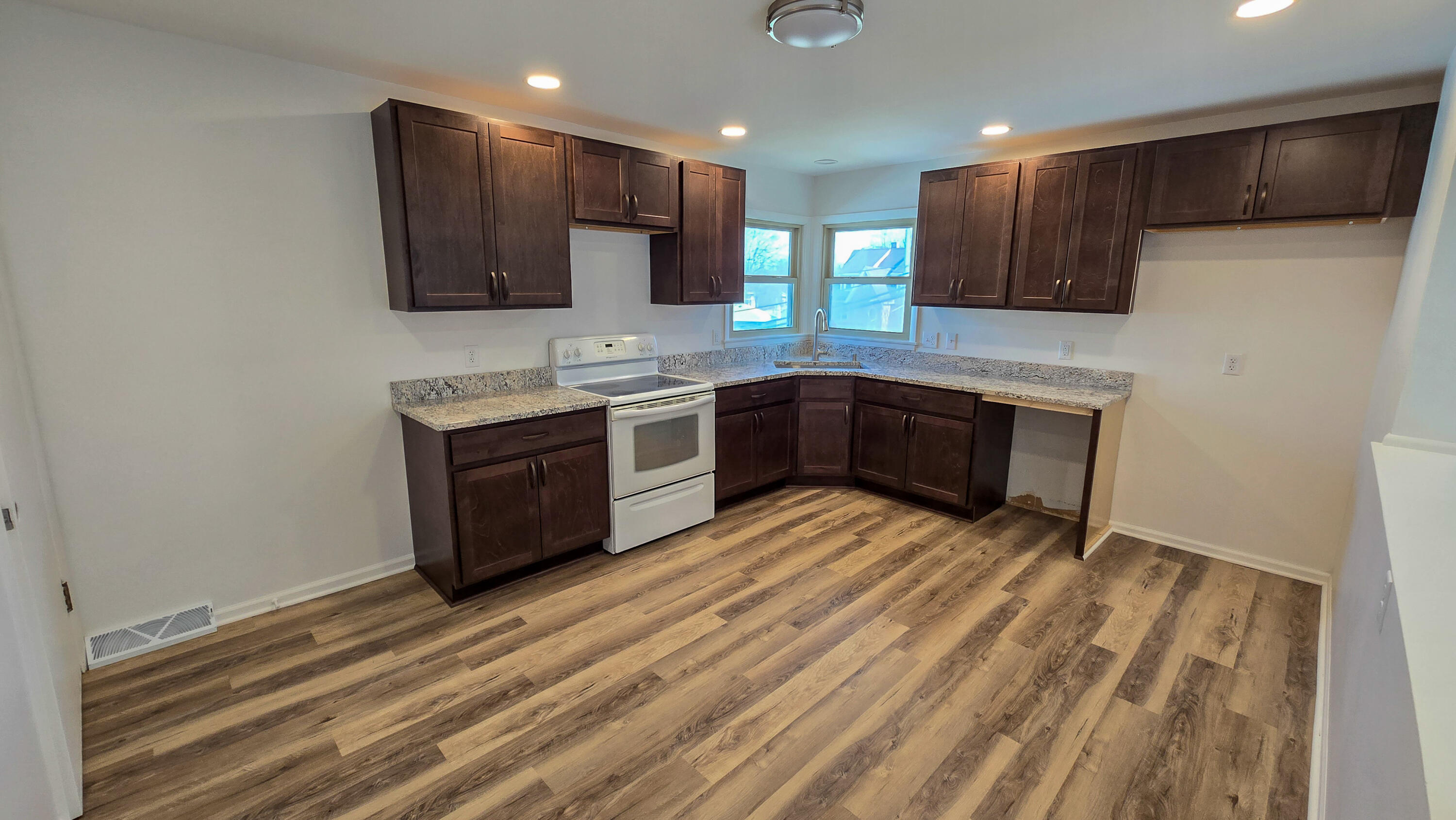 231 Prospect Avenue Pewaukee, WI 53072 - Photo 14 of 21 Upper Level Kitchen