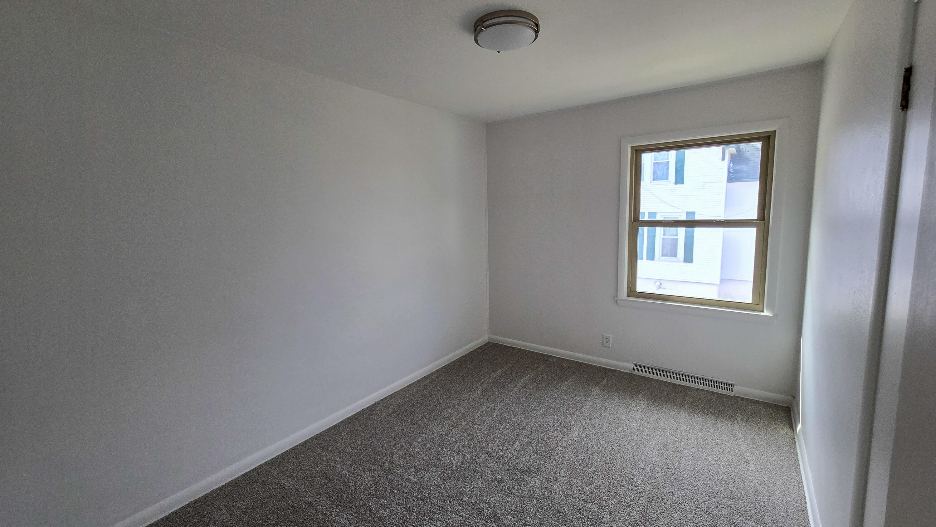 231 Prospect Avenue Pewaukee, WI 53072 - Photo 20 of 21 Upper Level 3rd Bedroom View 1