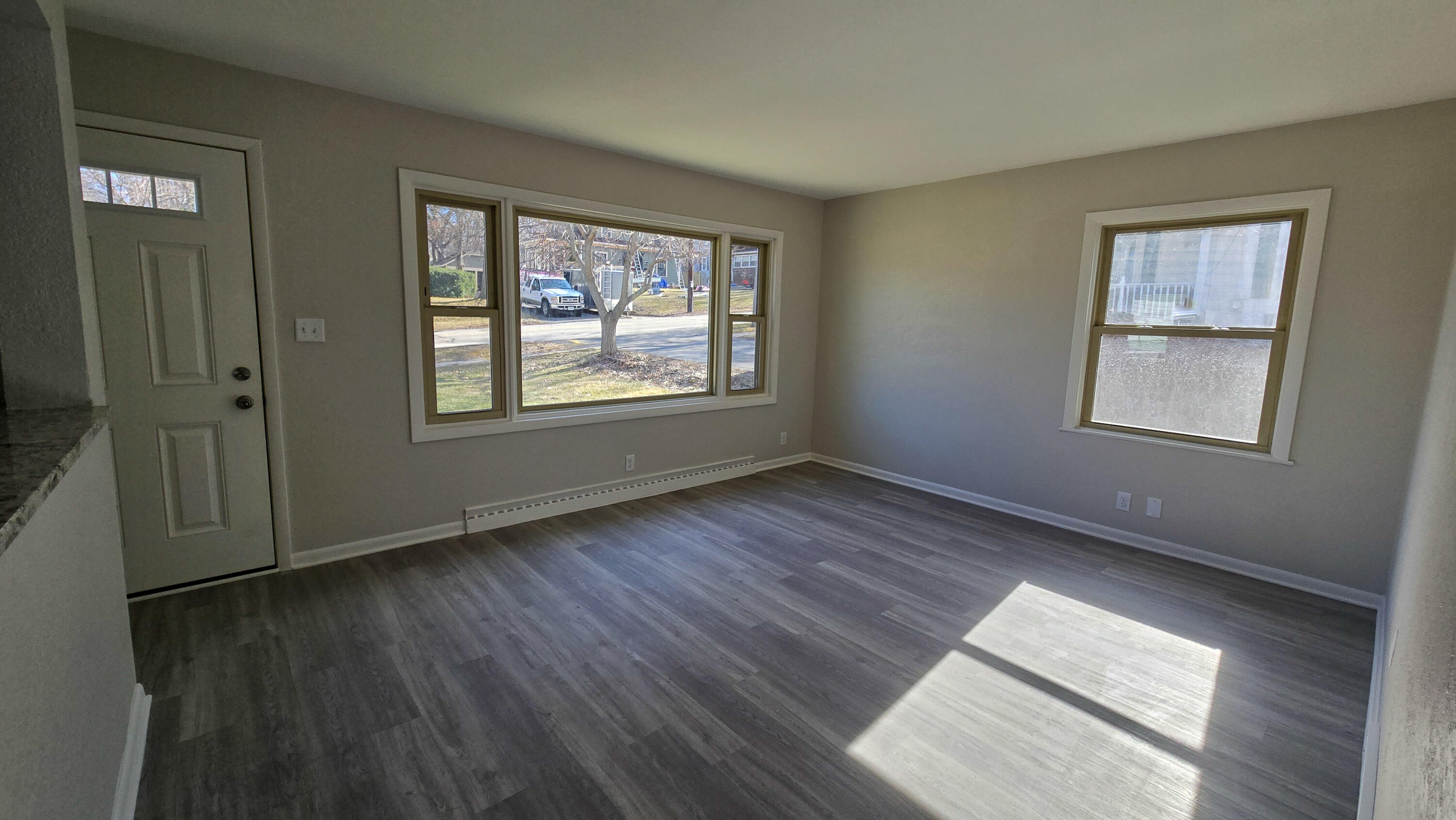 231 Prospect Avenue Pewaukee, WI 53072 - Photo 2 of 21 Lower Living Room View 1