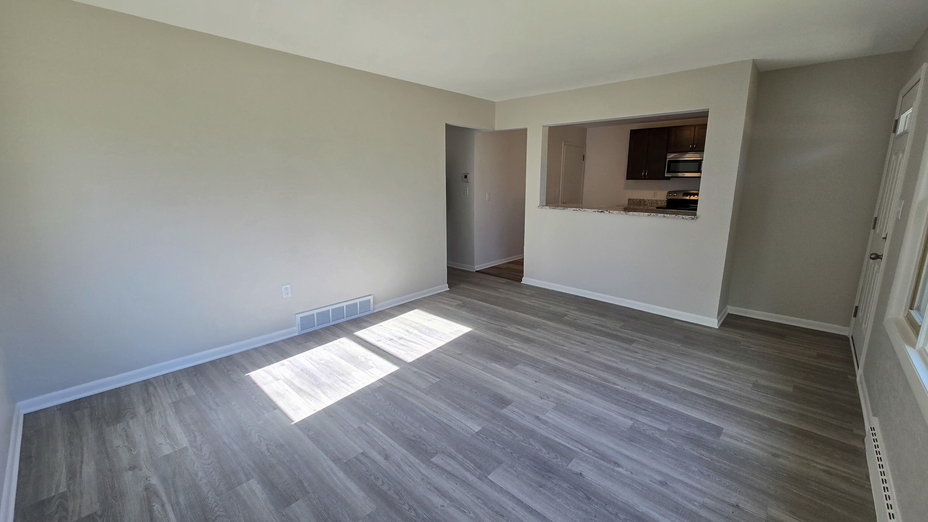 231 Prospect Avenue Pewaukee, WI 53072 - Photo 3 of 21 Lower Living Room View 2
