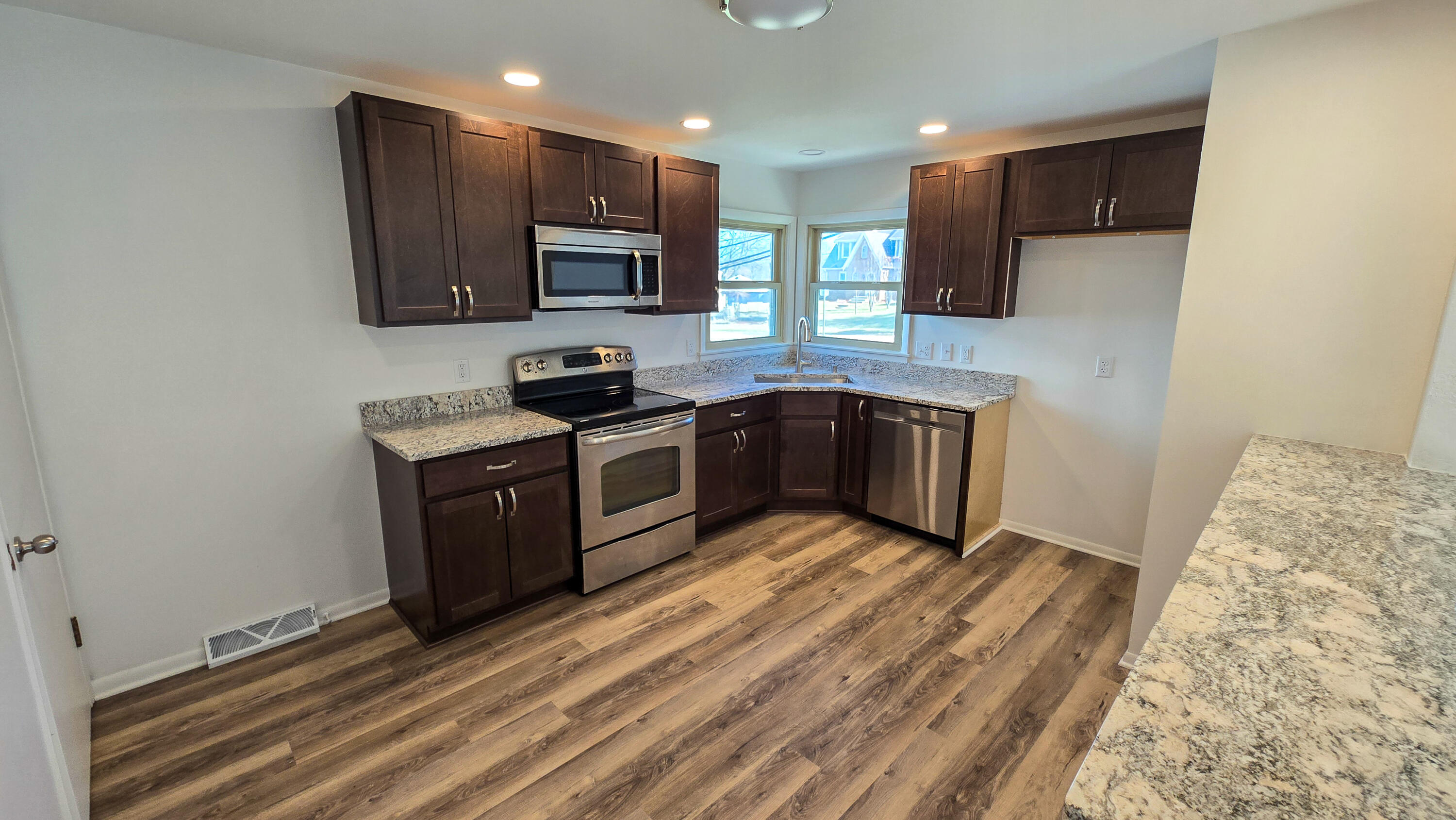 231 Prospect Avenue Pewaukee, WI 53072 - Photo 4 of 21 Lower Level Kitchen