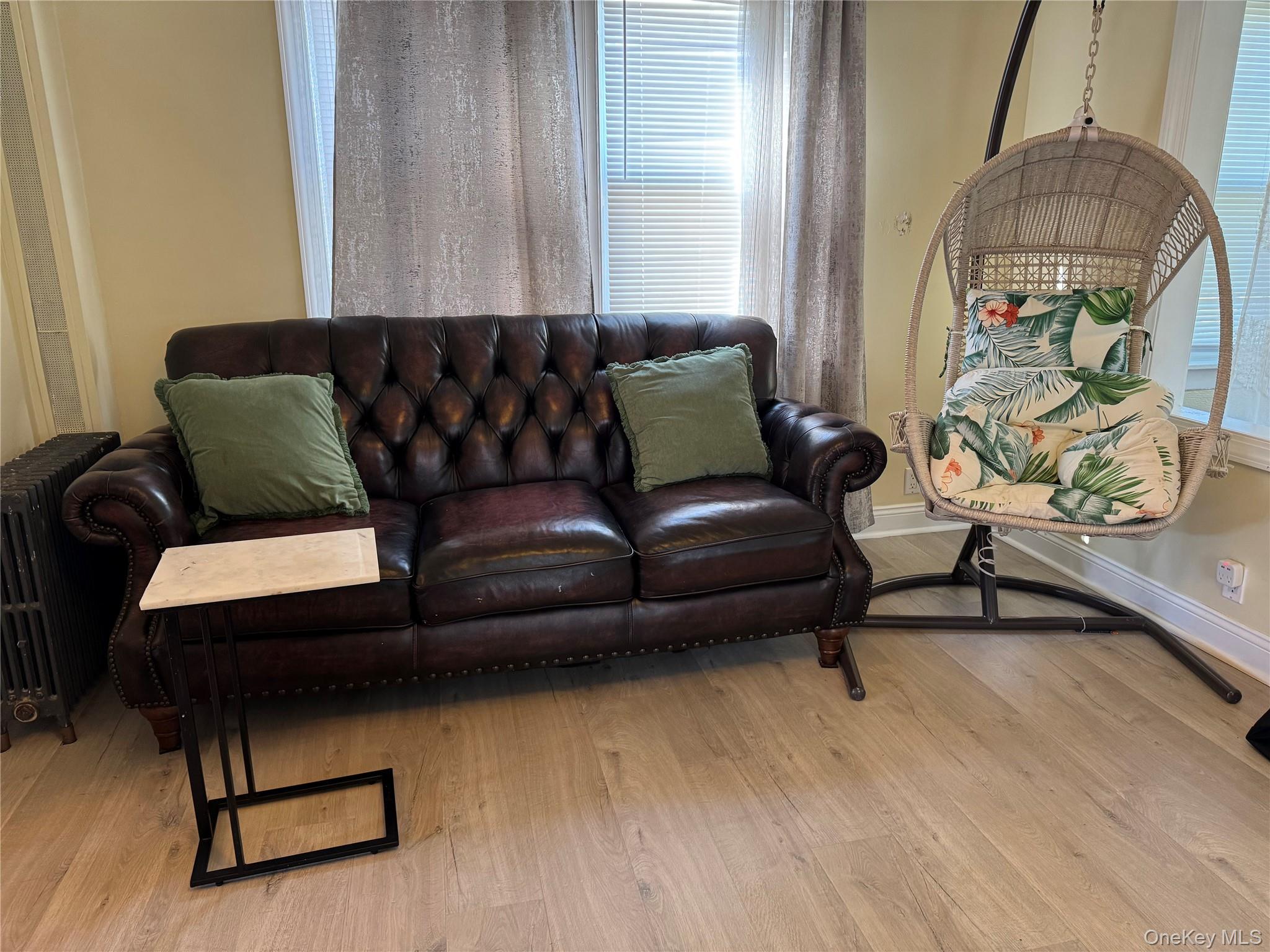 26 Parkside Drive Jericho, NY 11753 - Photo 7 of 25 a living room with furniture and a wooden floor
