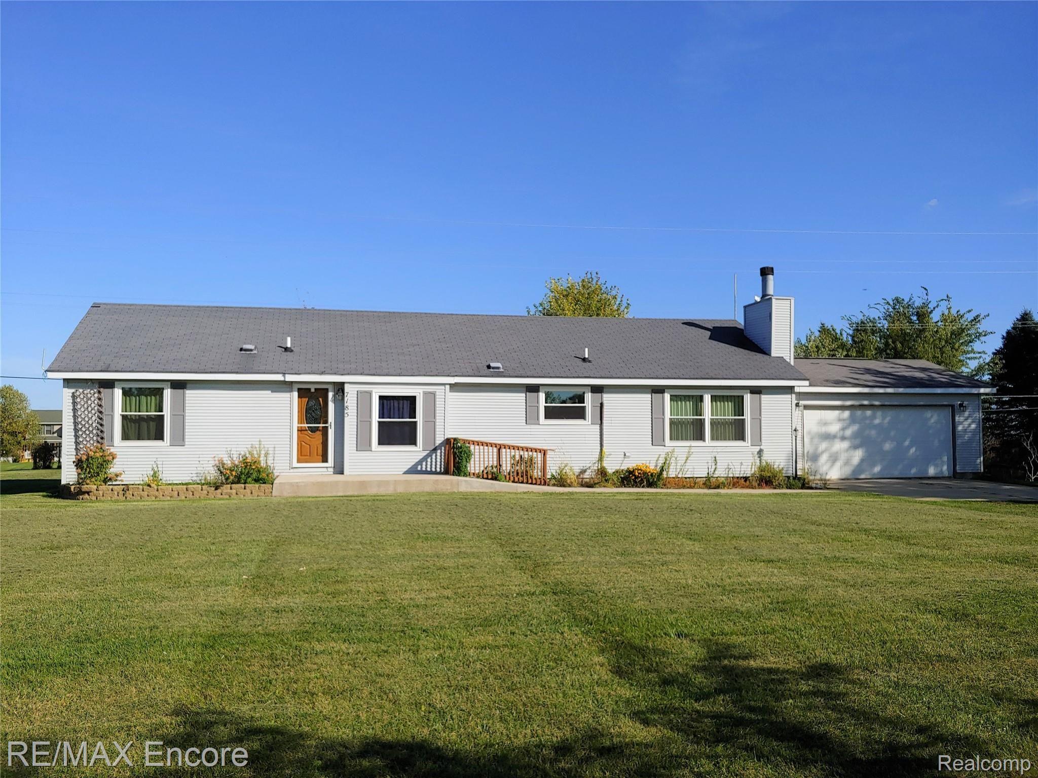 7185 Fostoria Road Mayville, MI 48744 - Photo 19 of 33 MAINTENANCE FREE VINYL SIDING
