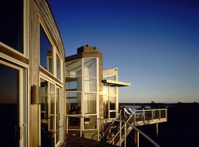Undisclosed Address Wellfleet, MA 02667 - Photo 5 of 8 a front view of a building with balcony
