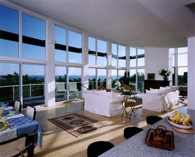 Undisclosed Address Wellfleet, MA 02667 - Photo 6 of 8 a living room with furniture and a floor to ceiling window