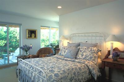 Undisclosed Address Wellfleet, MA 02667 - Photo 8 of 8 a bedroom with a bed and a window