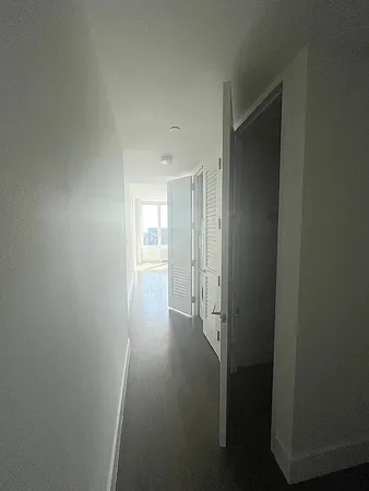 a view of hallway with an empty space
