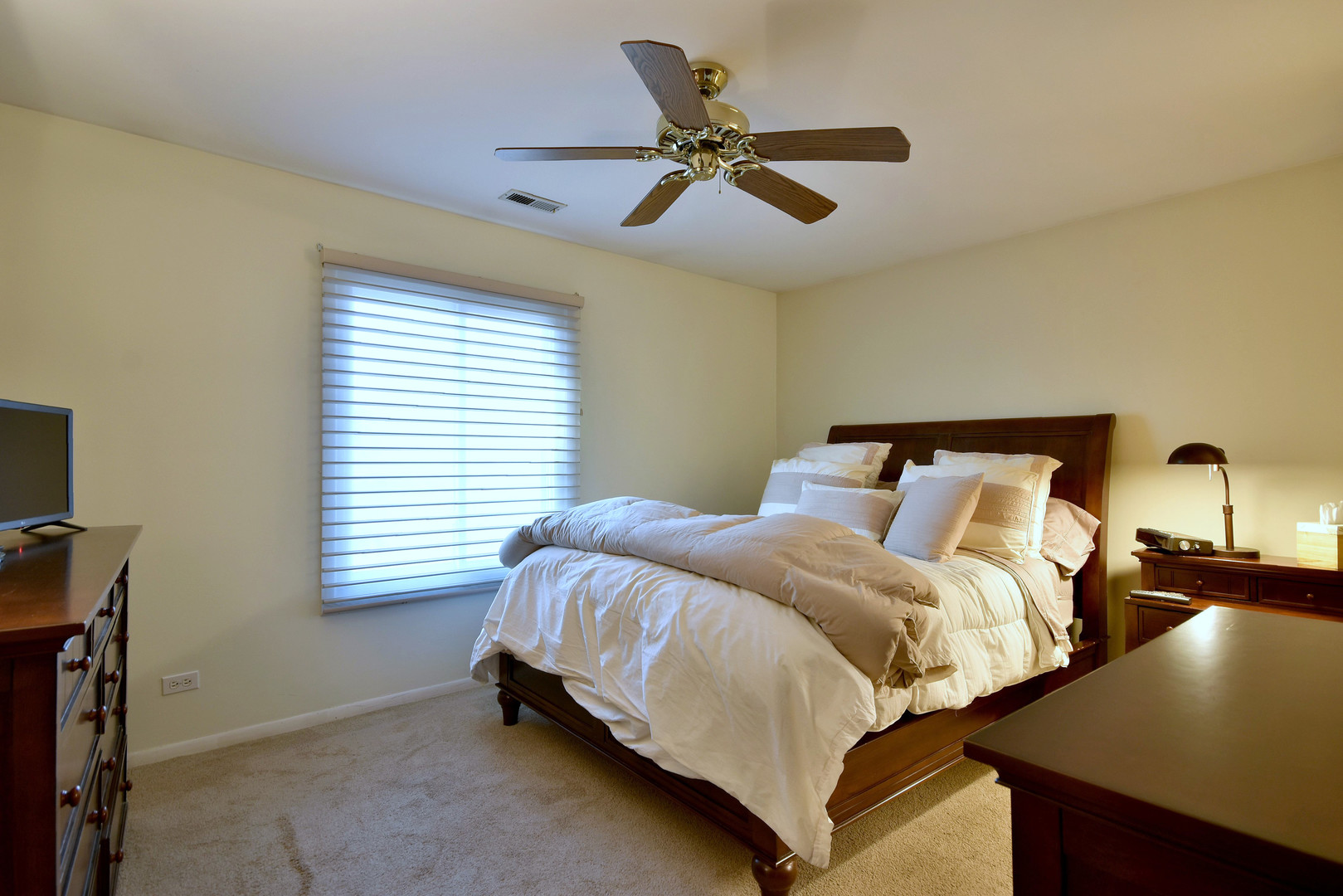 1652 Dover Court, Unit B Wheaton, IL 60189 - Photo 14 of 29 a bedroom with a bed and a window