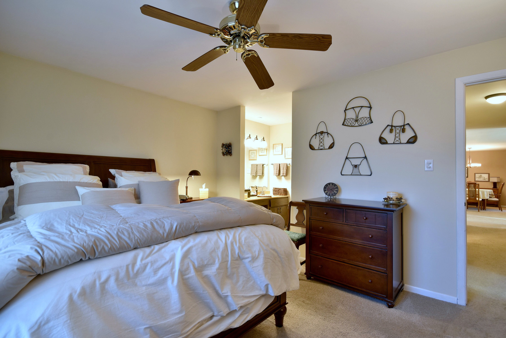 1652 Dover Court, Unit B Wheaton, IL 60189 - Photo 15 of 29 a bedroom with a bed and a chandelier