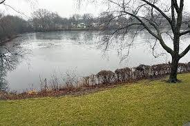 1652 Dover Court, Unit B Wheaton, IL 60189 - Photo 28 of 29 a view of a lake with a big yard