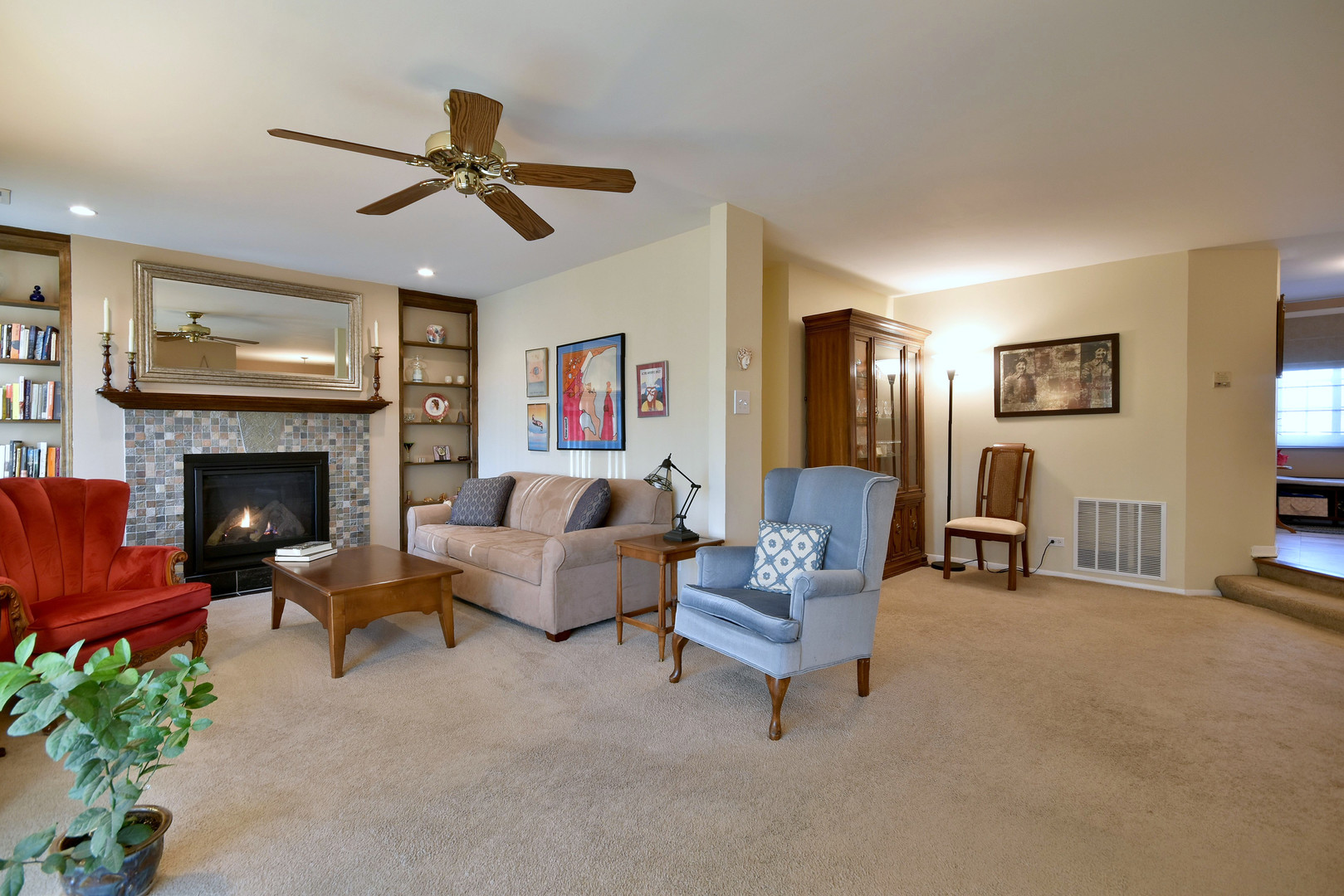 1652 Dover Court, Unit B Wheaton, IL 60189 - Photo 5 of 29 a living room with furniture and a fireplace
