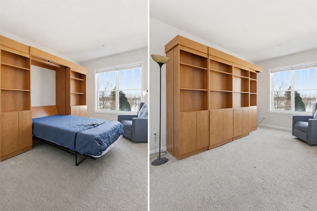 2306 Talbot Way, Unit 2306 Westborough, MA 01581 - Photo 15 of 37 a bedroom with a bed and cabinet