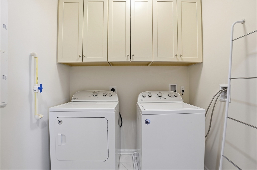 2306 Talbot Way, Unit 2306 Westborough, MA 01581 - Photo 22 of 37 a utility room with dryer and washer