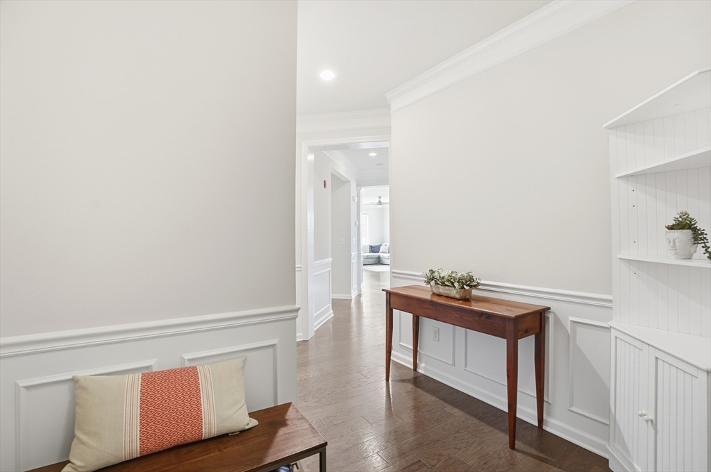 2306 Talbot Way, Unit 2306 Westborough, MA 01581 - Photo 23 of 37 a room with a table and chairs