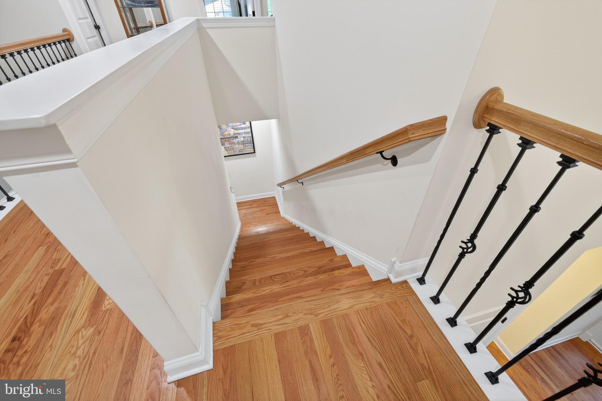 2623 Pike Creek Road Wilmington, DE 19808 - Photo 42 of 66 Elegant staircase with warm wood tones.