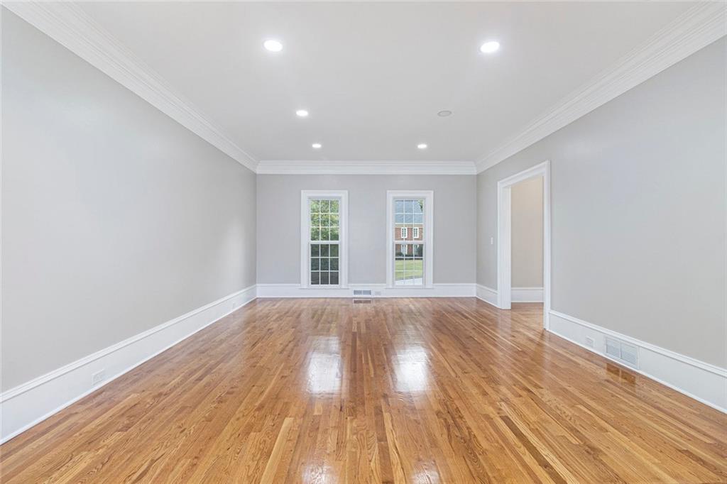 2820 Harwick Drive Atlanta, GA 30350 - Photo 21 of 48 wooden floor in an empty room with a window