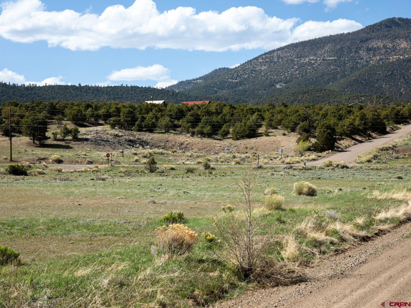 127 Browns Road South Fork, CO 81154 - Photo 16 of 44 a view of a lake with a mountain
