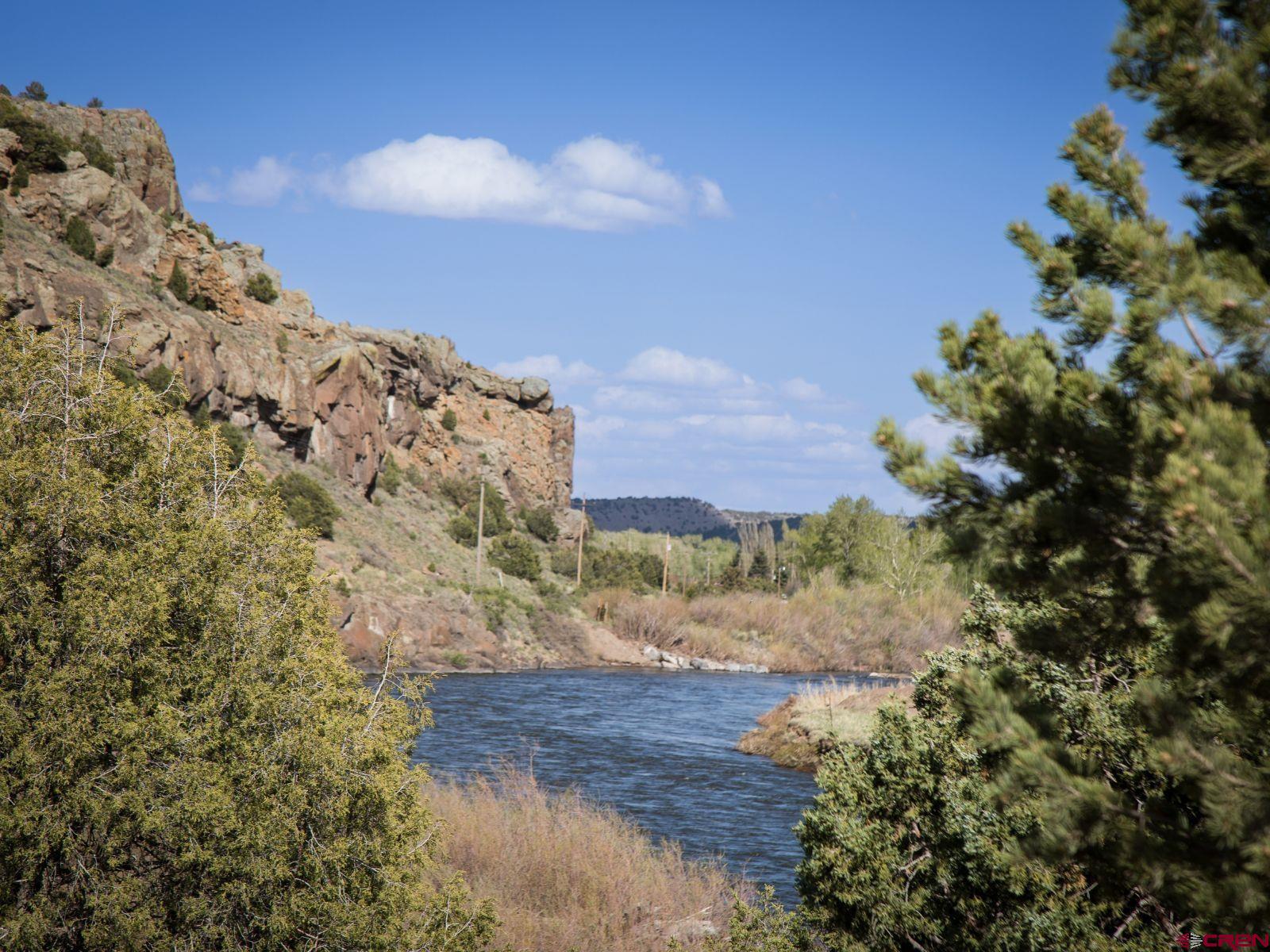127 Browns Road South Fork, CO 81154 - Photo 20 of 44 a view of a dry yard with wooden fence