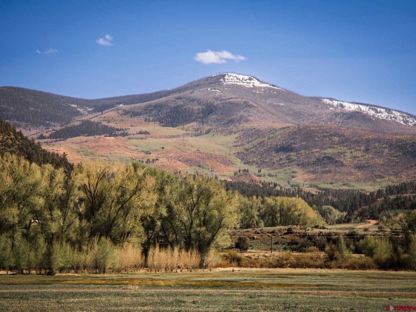 127 Browns Road South Fork, CO 81154 - Photo 2 of 44 a view of a town with mountains