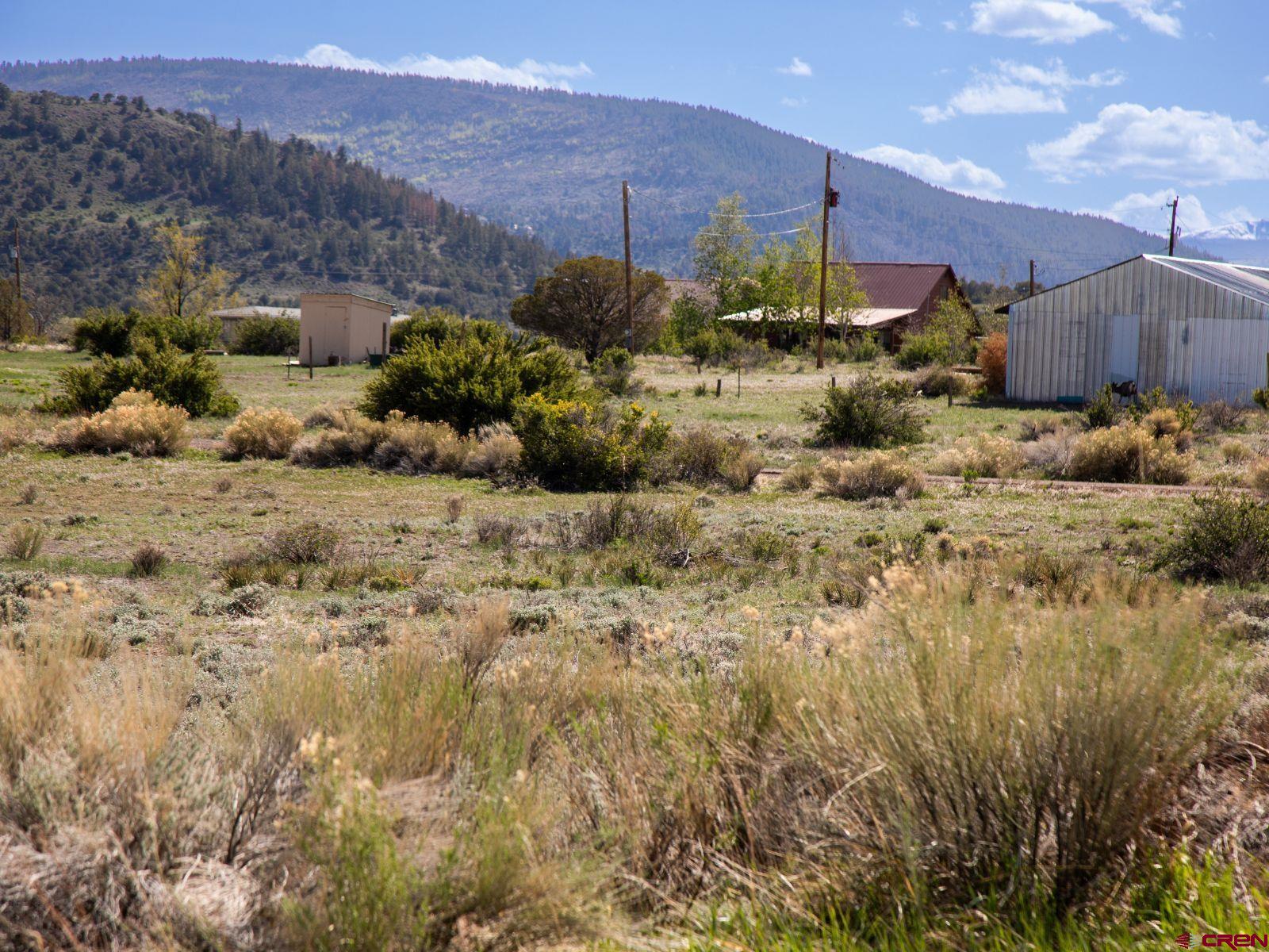 127 Browns Road South Fork, CO 81154 - Photo 23 of 44 a view of a houses with a yard