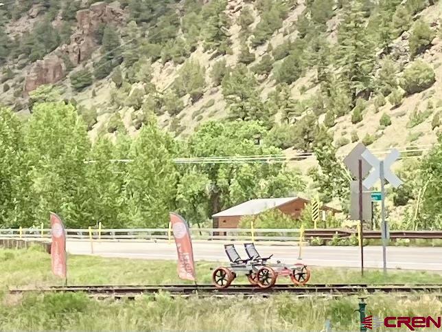 127 Browns Road South Fork, CO 81154 - Photo 25 of 44 a view of a swimming pool with an ocean view