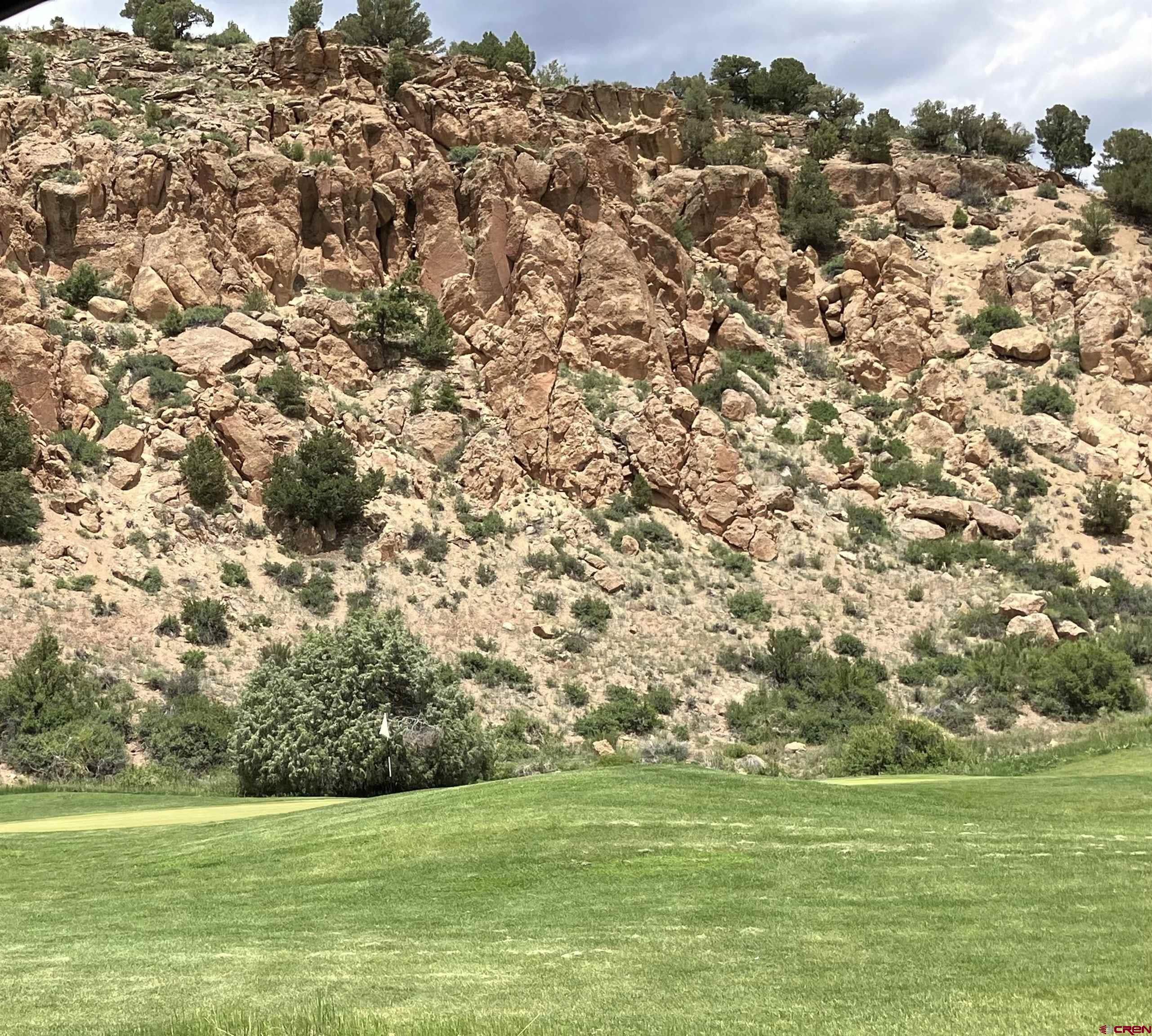 127 Browns Road South Fork, CO 81154 - Photo 26 of 44 a view of a green field with an ocean view