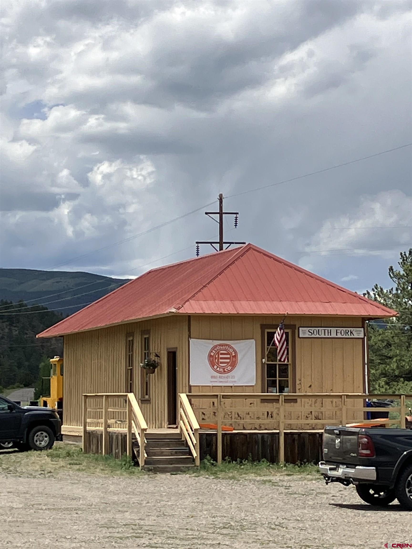 127 Browns Road South Fork, CO 81154 - Photo 43 of 44 a front view of a house with car parked