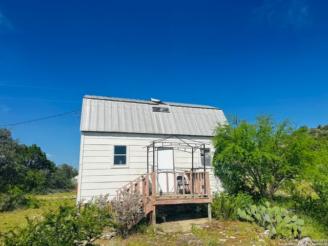 a house view with a outdoor space