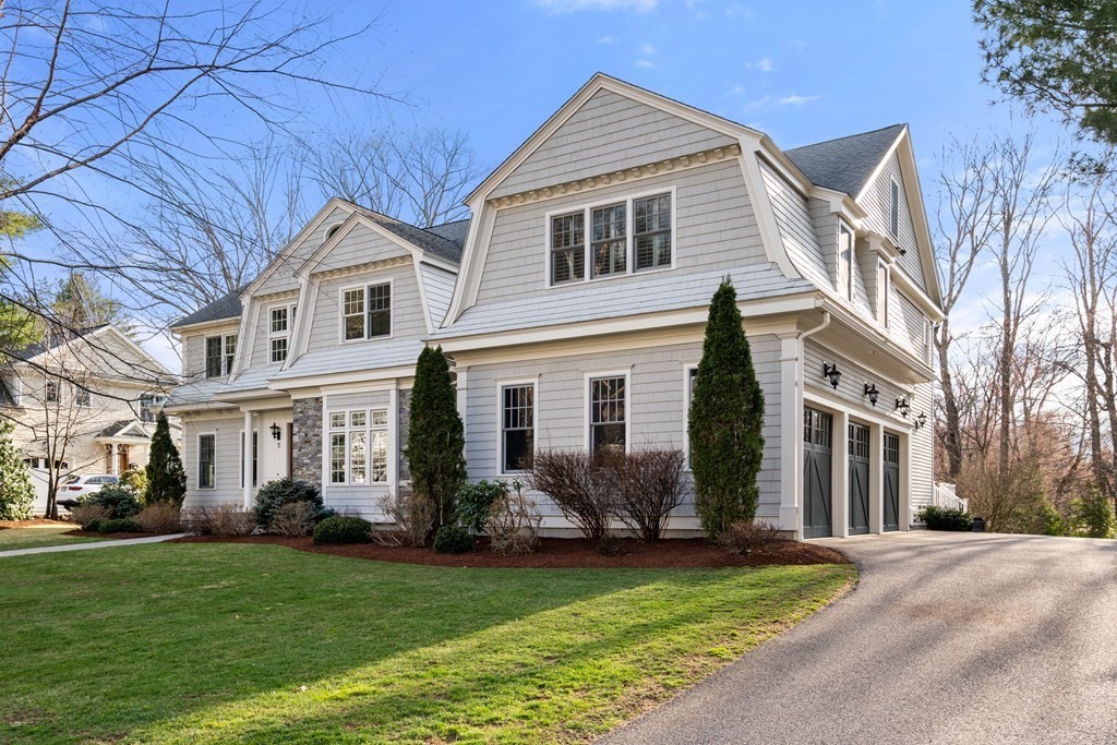 11 Lehigh Road Wellesley, MA 02482 - Photo 3 of 41 a front view of a house with a garden