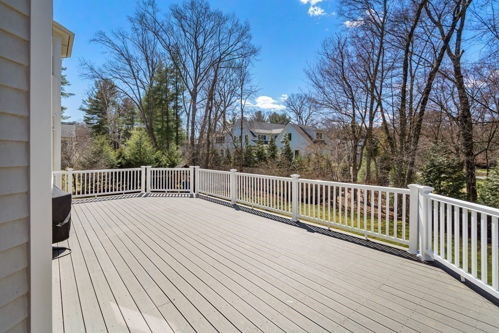 11 Lehigh Road Wellesley, MA 02482 - Photo 36 of 41 a view of balcony with wooden floor and fence
