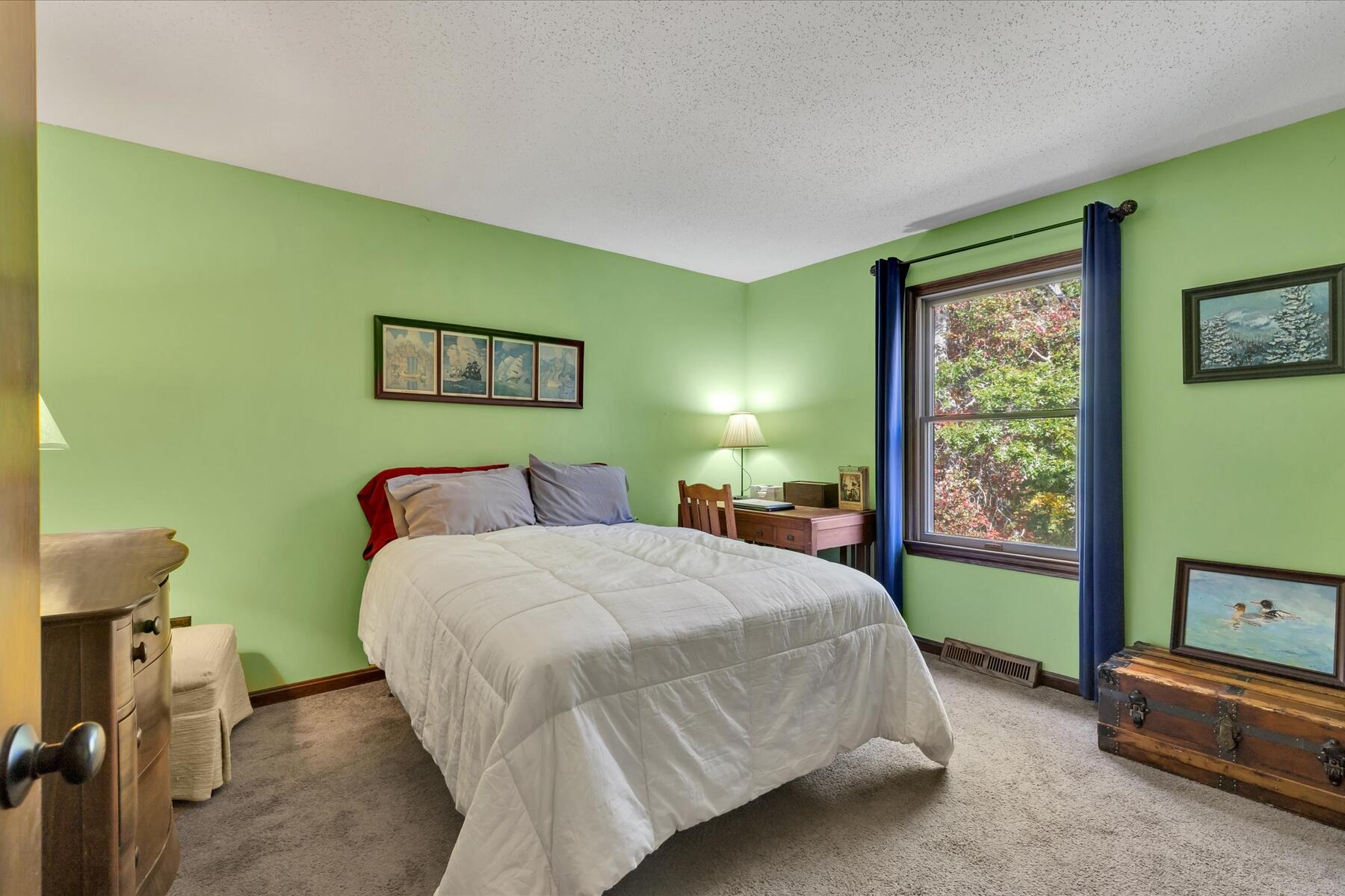 7 Sandy Way Mashpee, MA 02649 - Photo 16 of 41 a bedroom with a bed and a painting on the wall